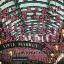 An apple market covered with hundreds of British Flags